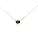 Pendant with a blue topaz on a paperclip chain 14kt yellow gold by Raymond Mazza