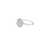 Aquamarine ring with 10mm round aqua stone with diamond halo 14kt white gold - Gaines Jewelers