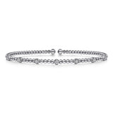 Bracelet flex cuff bangle set with 7 diamonds across the top 14kt white gold by Gabriel - Gaines Jewelers