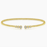 Bracelet- flex cuff bangle split top 6 diamonds 14kt yellow gold - Gaines Jewelers