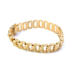 Bracelet open oval links textured and polished 14kt yellow gold - Gaines Jewelers