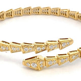 Bracelet, serpentine wrap style with diamonds 14kt yellow gold - Gaines Jewelers