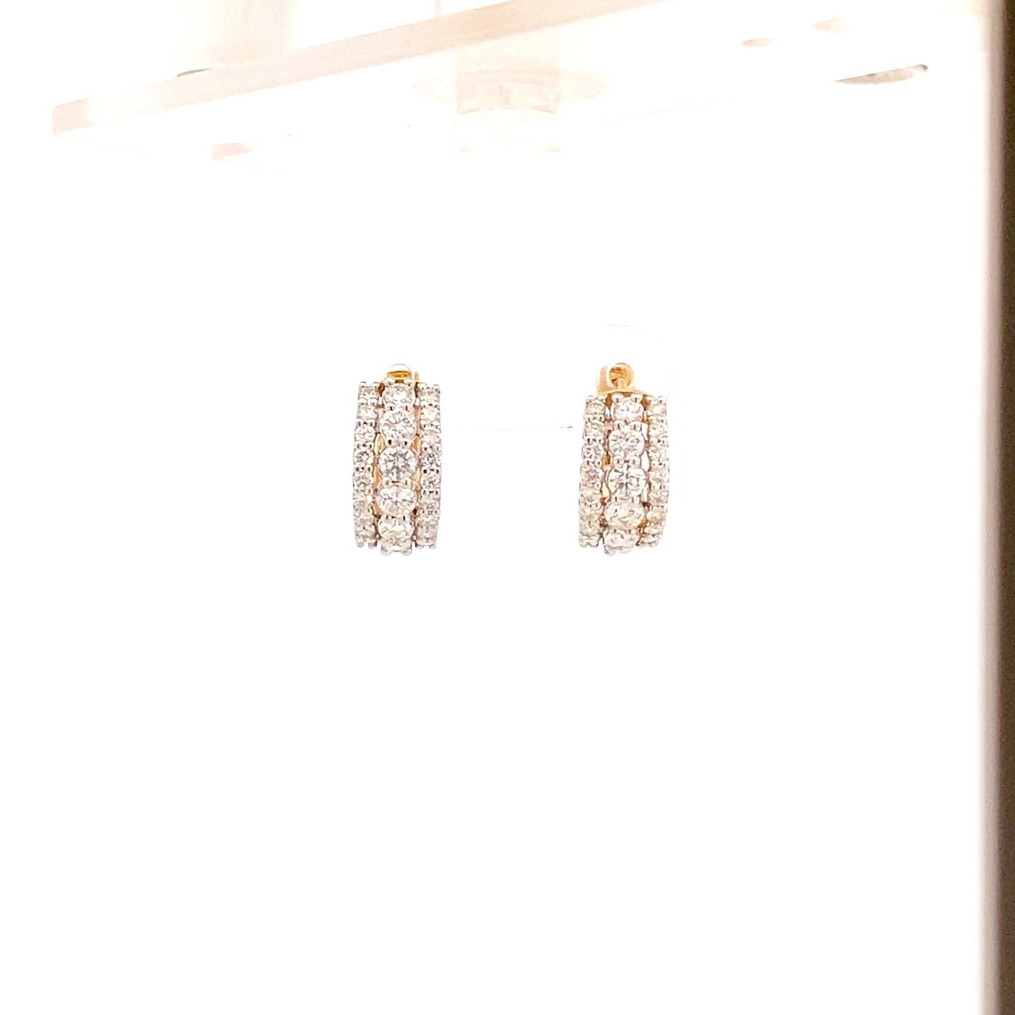 Earrings huggie style with 3 rows of diamonds 14kt white and yellow gold - Gaines Jewelers