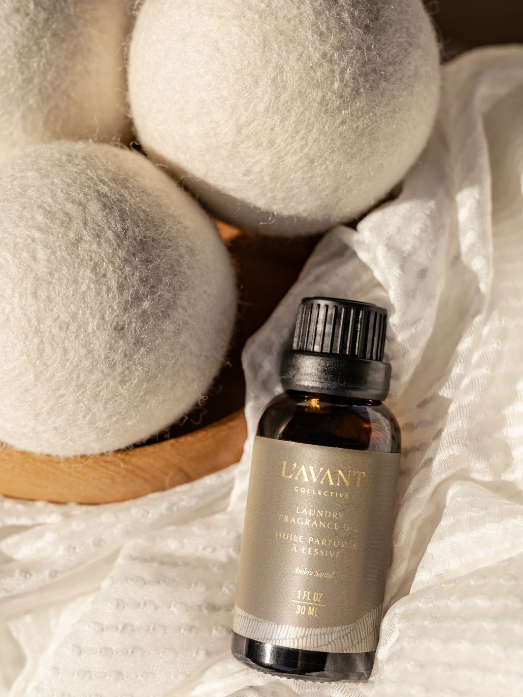 L'AVANT Collective - Laundry Oil Ambre Santal - Gaines Jewelers