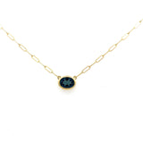 Pendant with a blue topaz on a paperclip chain 14kt yellow gold by Raymond Mazza - Gaines Jewelers