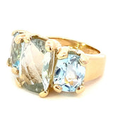 Ring set with a center green amethyst with side blue topaz in 14kt yellow gold - Gaines Jewelers