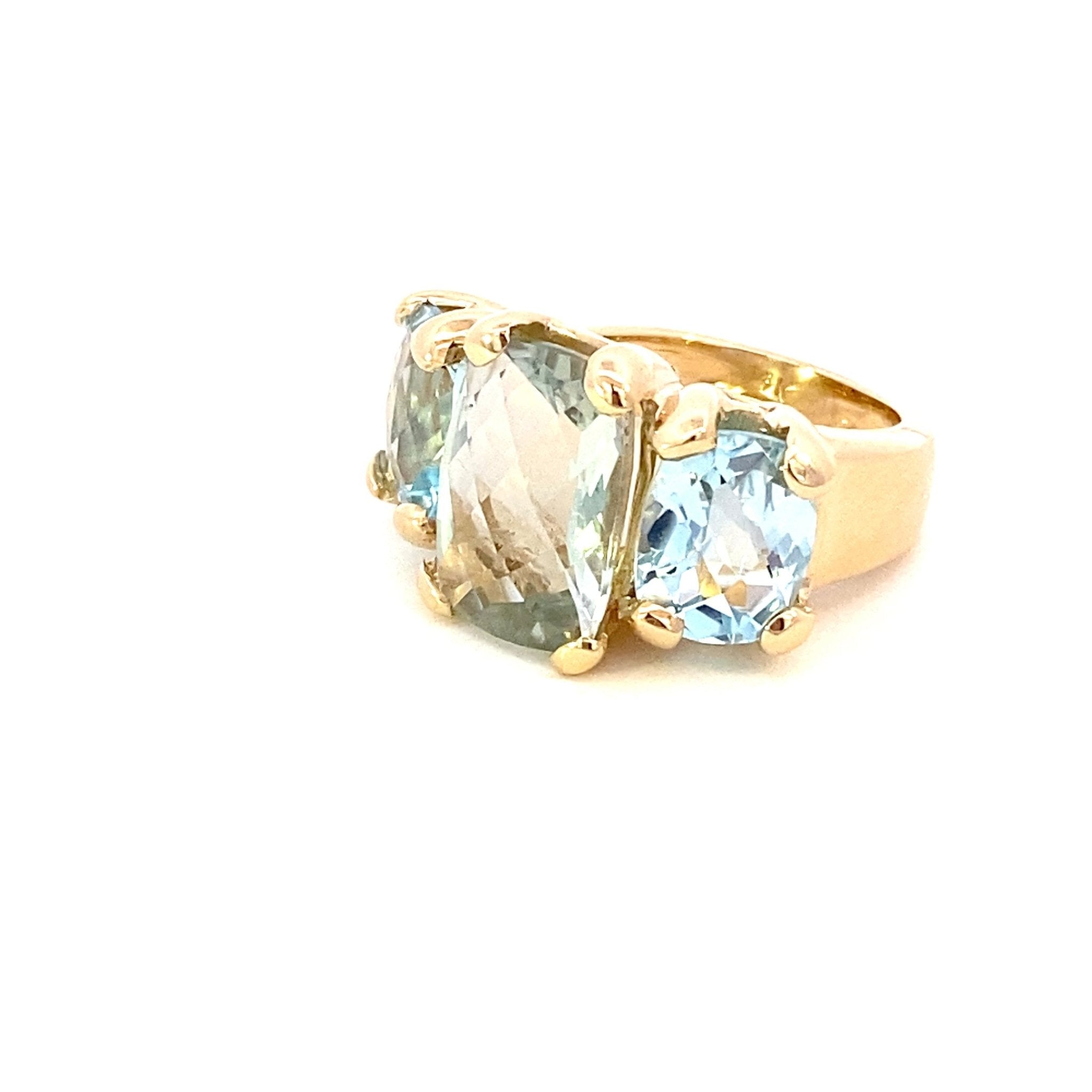Ring set with a center green amethyst with side blue topaz in 14kt yellow gold - Gaines Jewelers