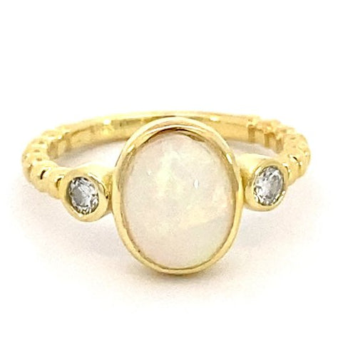 Ring set with an opal and accented with diamonds 14kt yellow gold - Gaines Jewelers