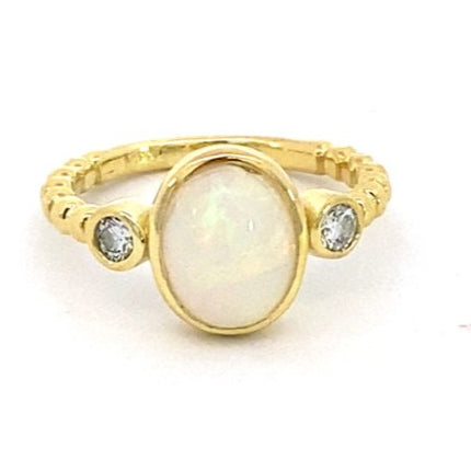 Ring set with an opal and accented with diamonds 14kt yellow gold - Gaines Jewelers