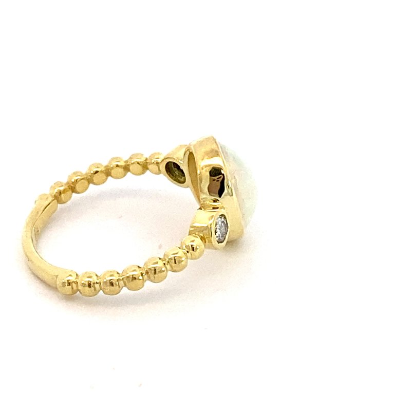 Ring set with an opal and accented with diamonds 14kt yellow gold - Gaines Jewelers