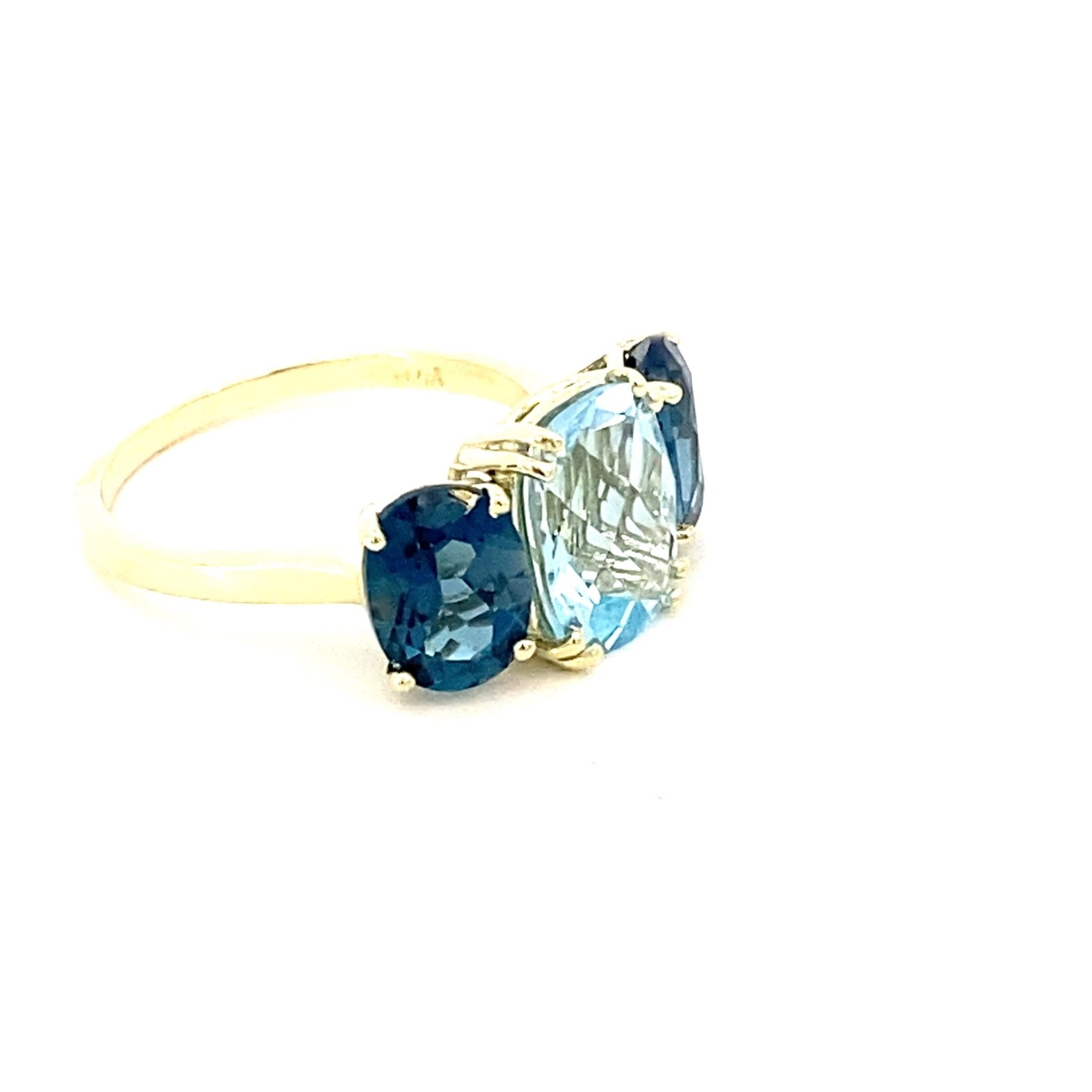 Ring with Sky blue topaz flanked by London blue topaz 14kt yellow gold - Gaines Jewelers