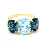 Ring with Sky blue topaz flanked by London blue topaz 14kt yellow gold - Gaines Jewelers