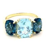 Ring with Sky blue topaz flanked by London blue topaz 14kt yellow gold - Gaines Jewelers