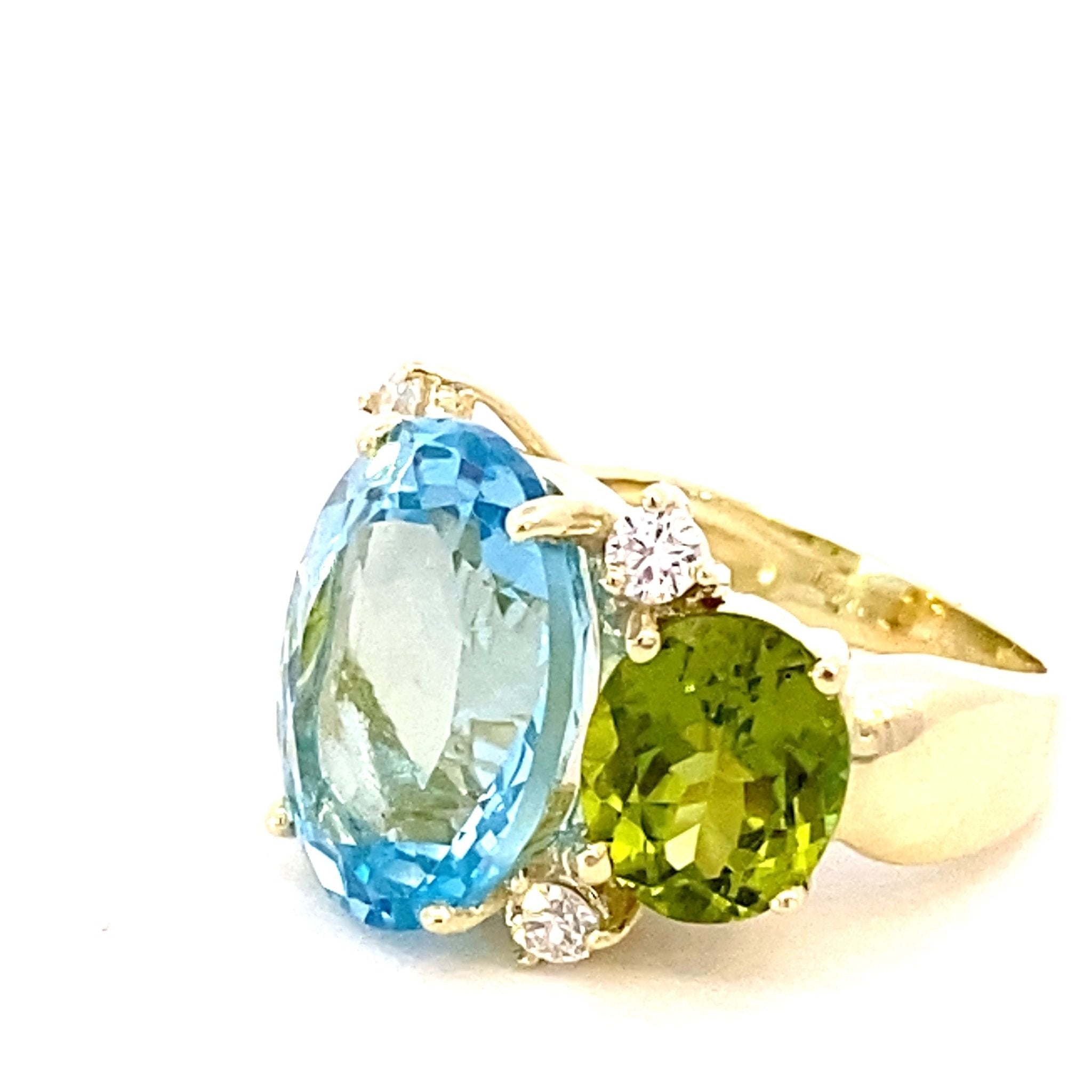 Ring with sky blue topaz peridot and diamonds 14kt yellow gold - Gaines Jewelers