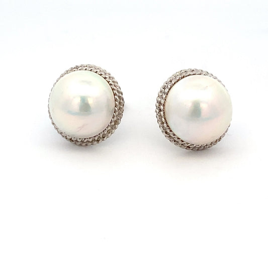 Earrings- 2 round mabe pearl braid bezel - Gaines Jewelers