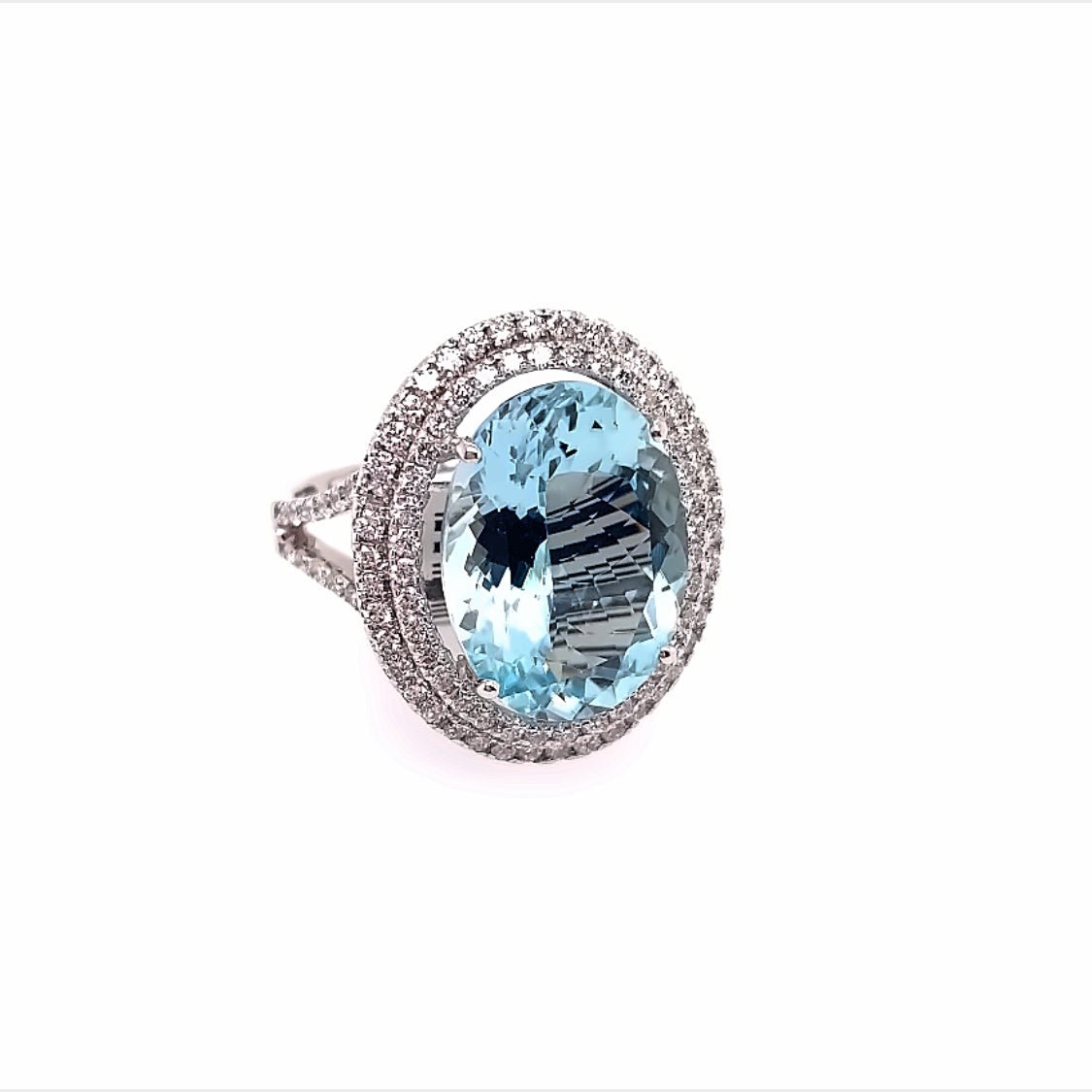 Ring- 14k wg Oval Aquamarine with double diamond halo - Gaines Jewelers