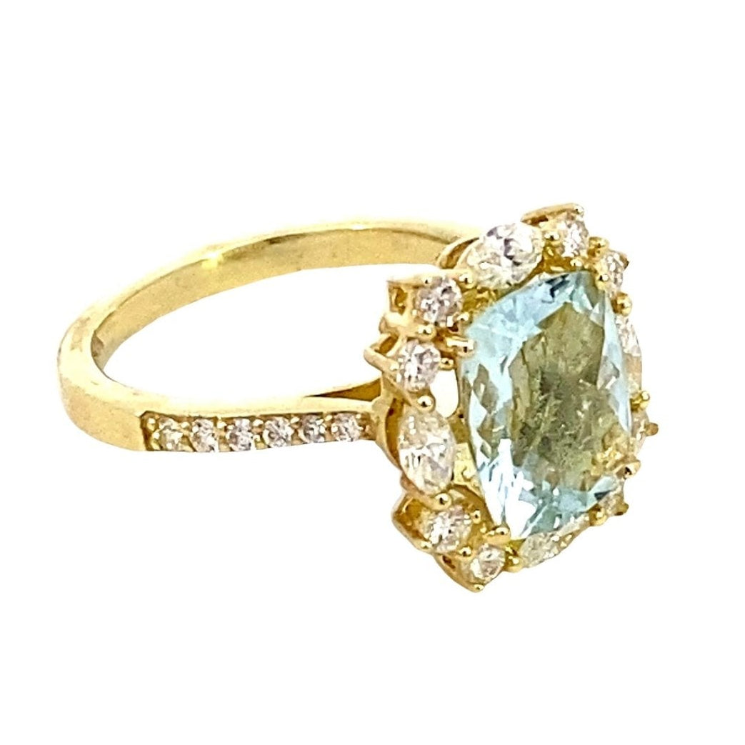 Ring aquamarine dial halo and shank 14kt yellow gold - Gaines Jewelers
