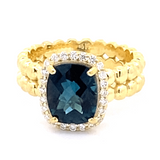 Ring London blue topaz diamond halo 14kt yellow gold - Gaines Jewelers