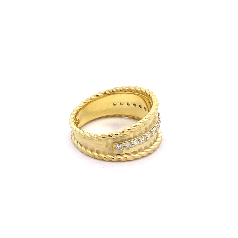 Ring designed as a wide band with center row of diamonds 14kt yellow gold