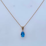 Oval Blue Topaz with Diamonds at Top 14kt Yellow Gold Pendant - Rego