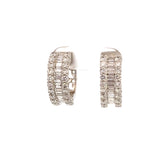 Diamond hoop earrings with center baguettes edged by rounds 18kt white gold by Hakman
