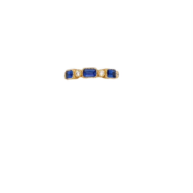 Ring sapphire and diamond in coin edge bezels 18kt yellow gold