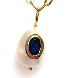 Blue Sapphire Bezel Set into a Small White Oval Pearl 14kt Yellow Gold Pendant - Raymond Mazza - Gaines Jewelers