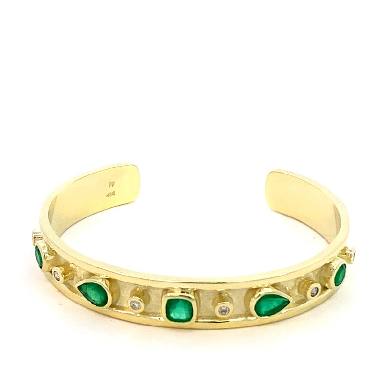 Bracelet bangle cuff style set with emeralds and diamonds 14kt yellow gold - Gaines Jewelers