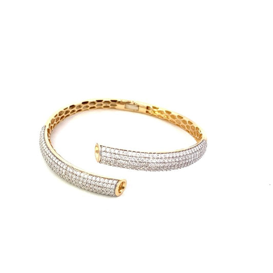 Bracelet bangle style with diamond bypass 14kt. yellow and white gold - Gaines Jewelers