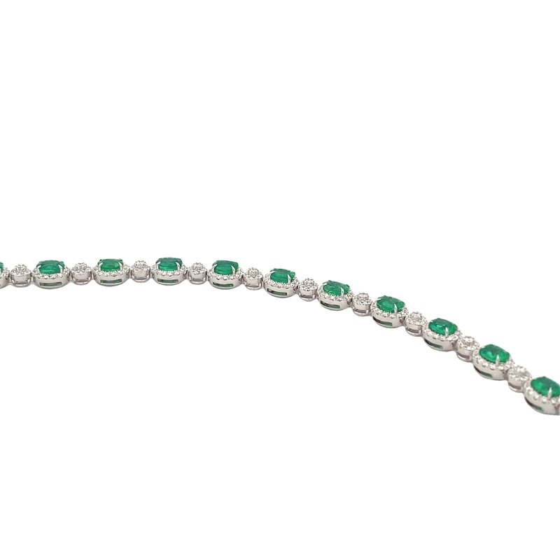 Bracelet - emerald straight line style with diamond halos 18kt white gold - Gaines Jewelers