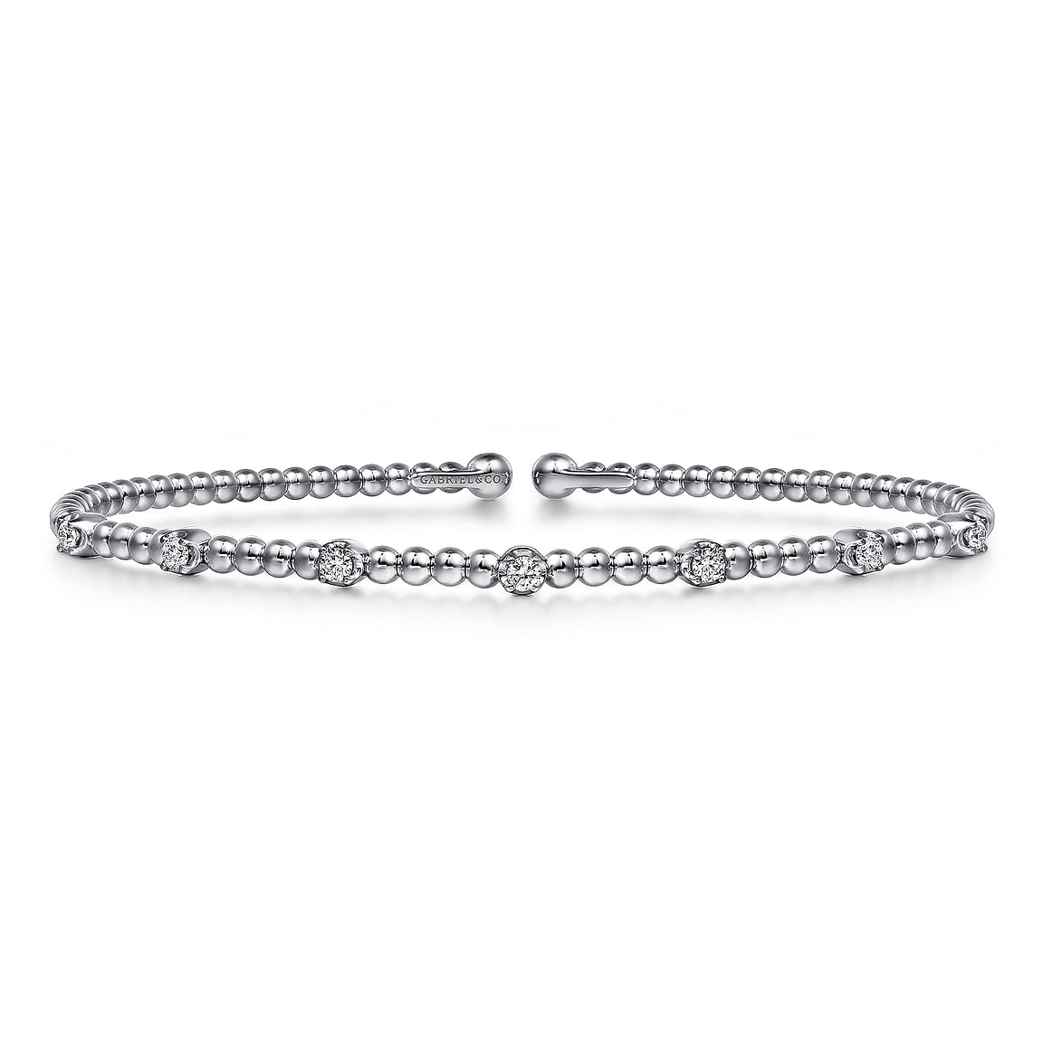 Bracelet flex cuff bangle set with 7 diamonds across the top 14kt white gold by Gabriel - Gaines Jewelers