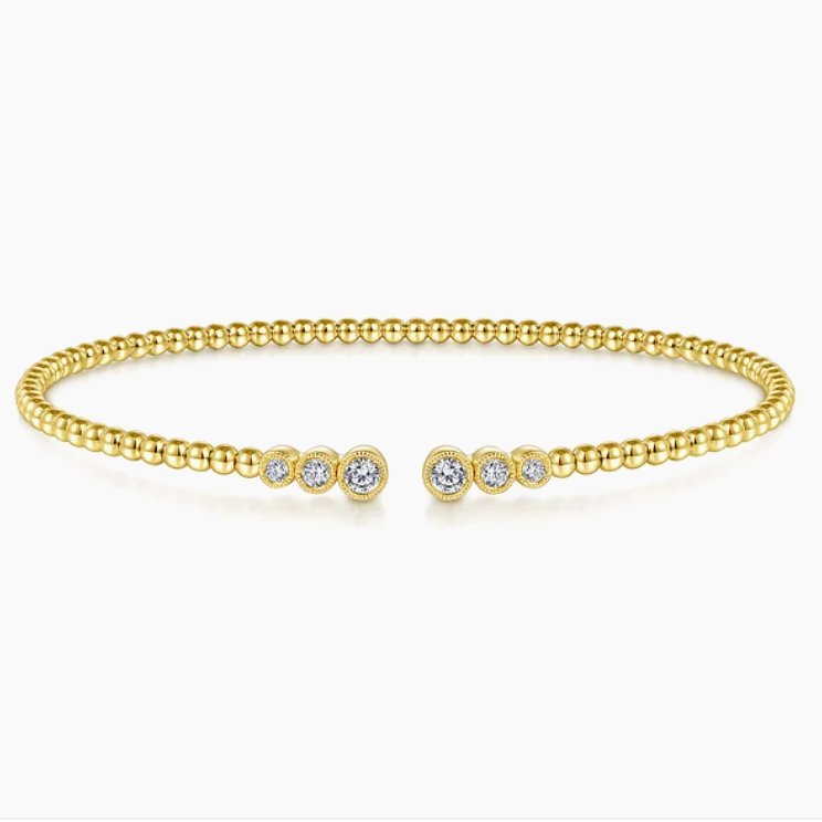 Bracelet- flex cuff bangle split top 6 diamonds 14kt yellow gold - Gaines Jewelers