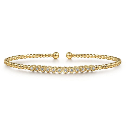 Bracelet flex cuff bangle with top bar set with 12 diamonds 14kt yellow gold - Gaines Jewelers