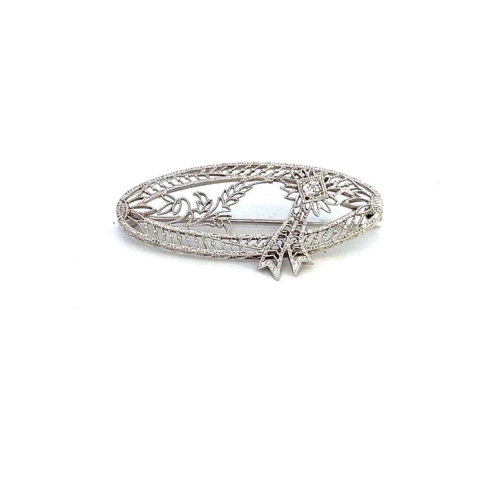 Brooch oval filligree diamond accent - Gaines Jewelers