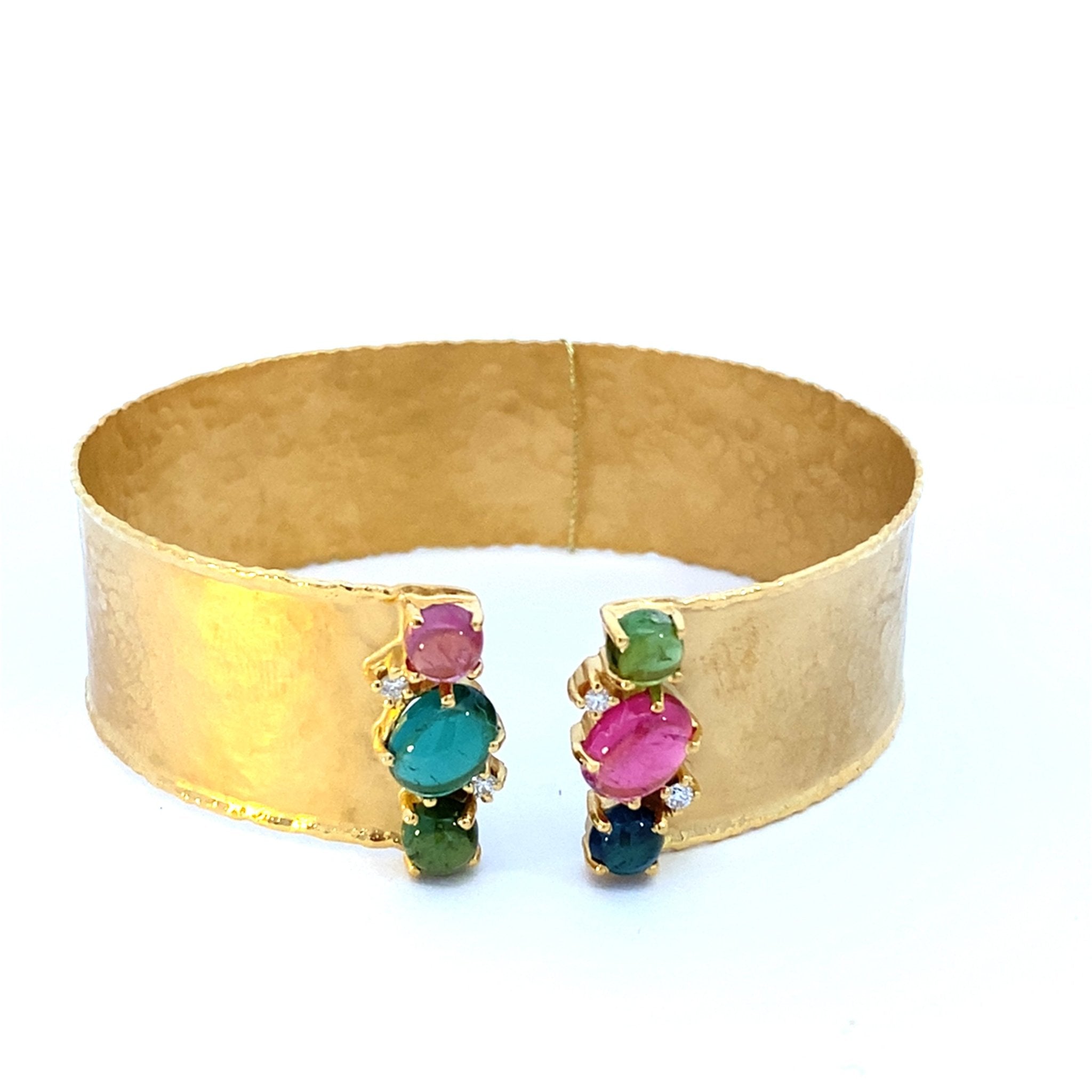 Cuff bracelet with a top split set with multi - color stones & diamonds in 14kt yellow gold by Marika - Gaines Jewelers