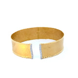 Cuff bracelet with hammered satin finish 1/2" wide in 14kt yellow gold by Marika - Gaines Jewelers
