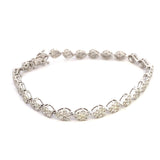 Diamond bracelet with pear - shaped clusters 14kt white gold by Sophia - Gaines Jewelers