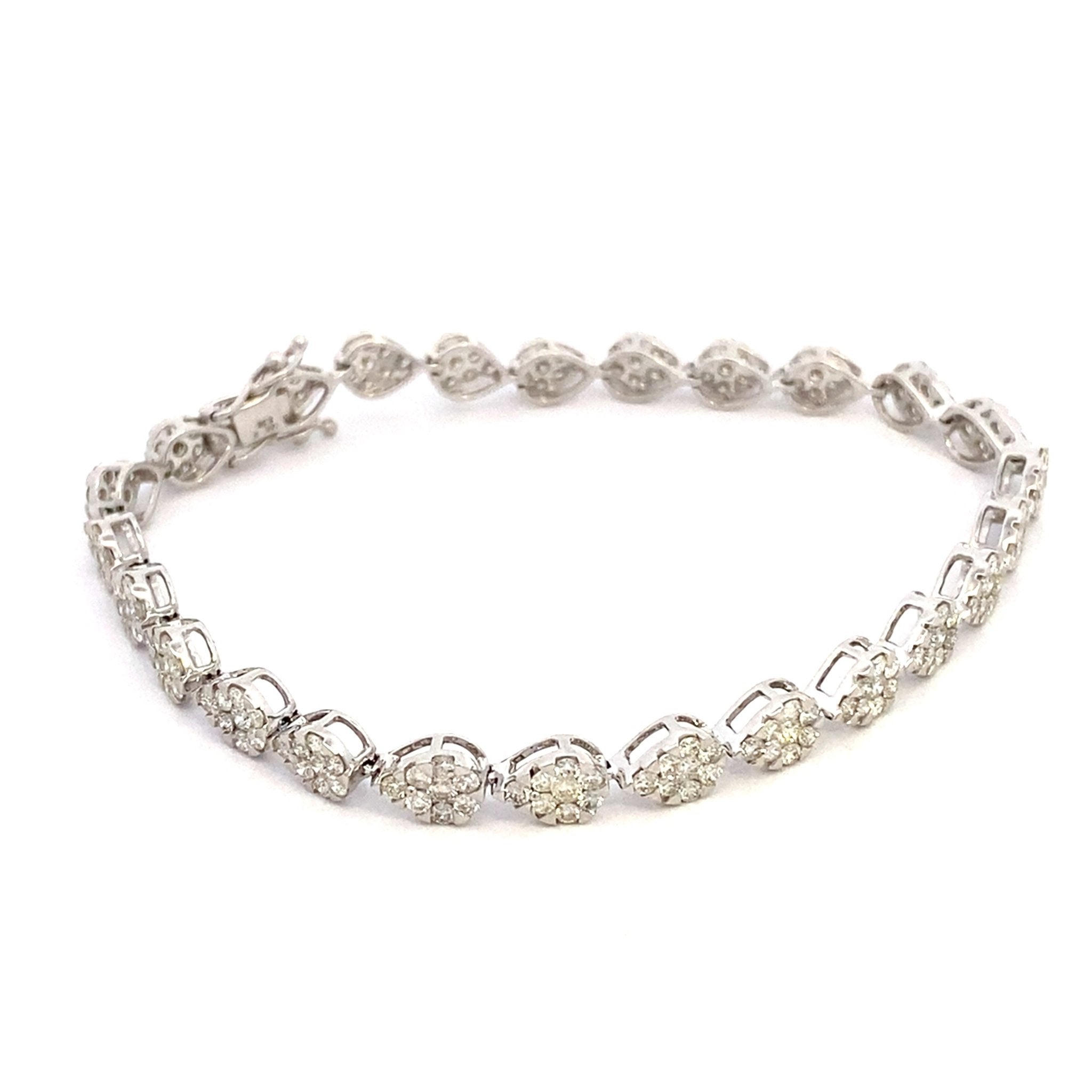 Diamond bracelet with pear - shaped clusters 14kt white gold by Sophia - Gaines Jewelers