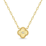 Diamond pendant with floral motif in 14kt yellow gold by Bassali - Gaines Jewelers