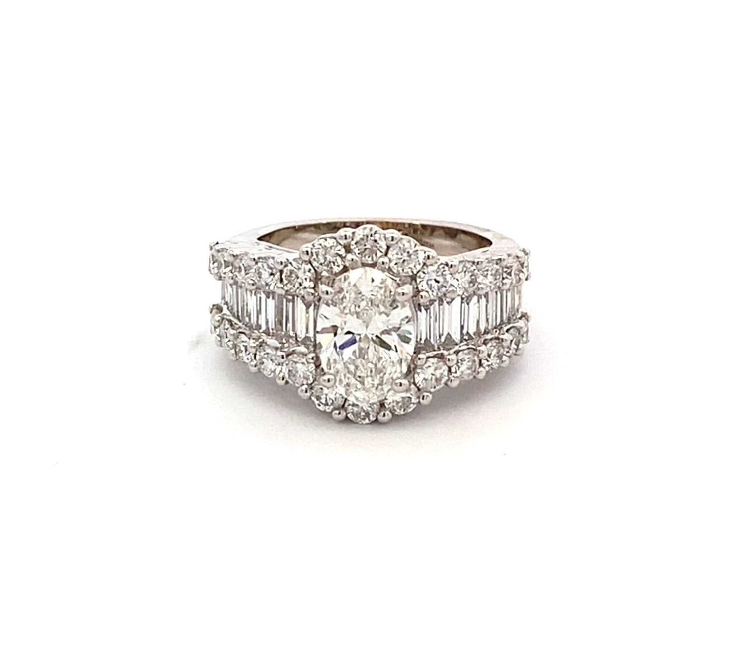 Diamond ring with lab oval center and natural side baguettes & rounds 14kt white gold - Gaines Jewelers