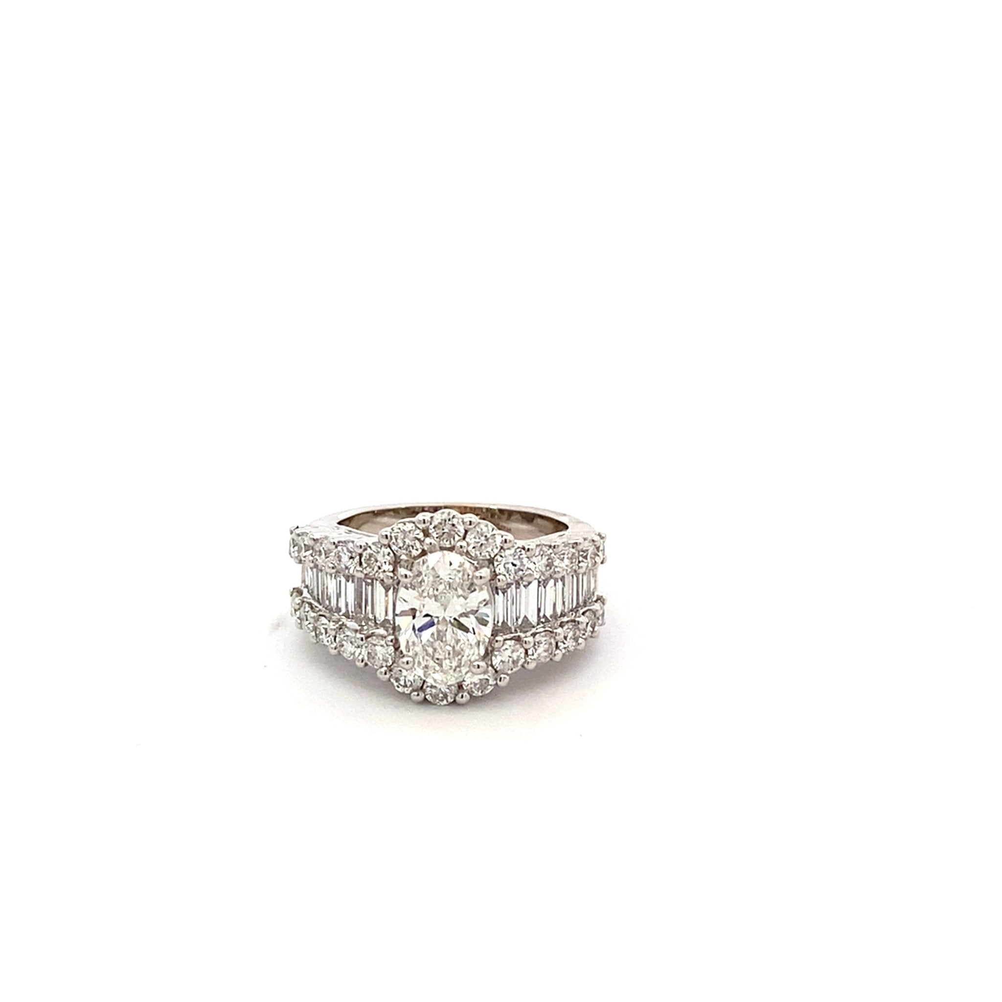 Diamond ring with lab oval center and natural side baguettes & rounds 14kt white gold - Gaines Jewelers