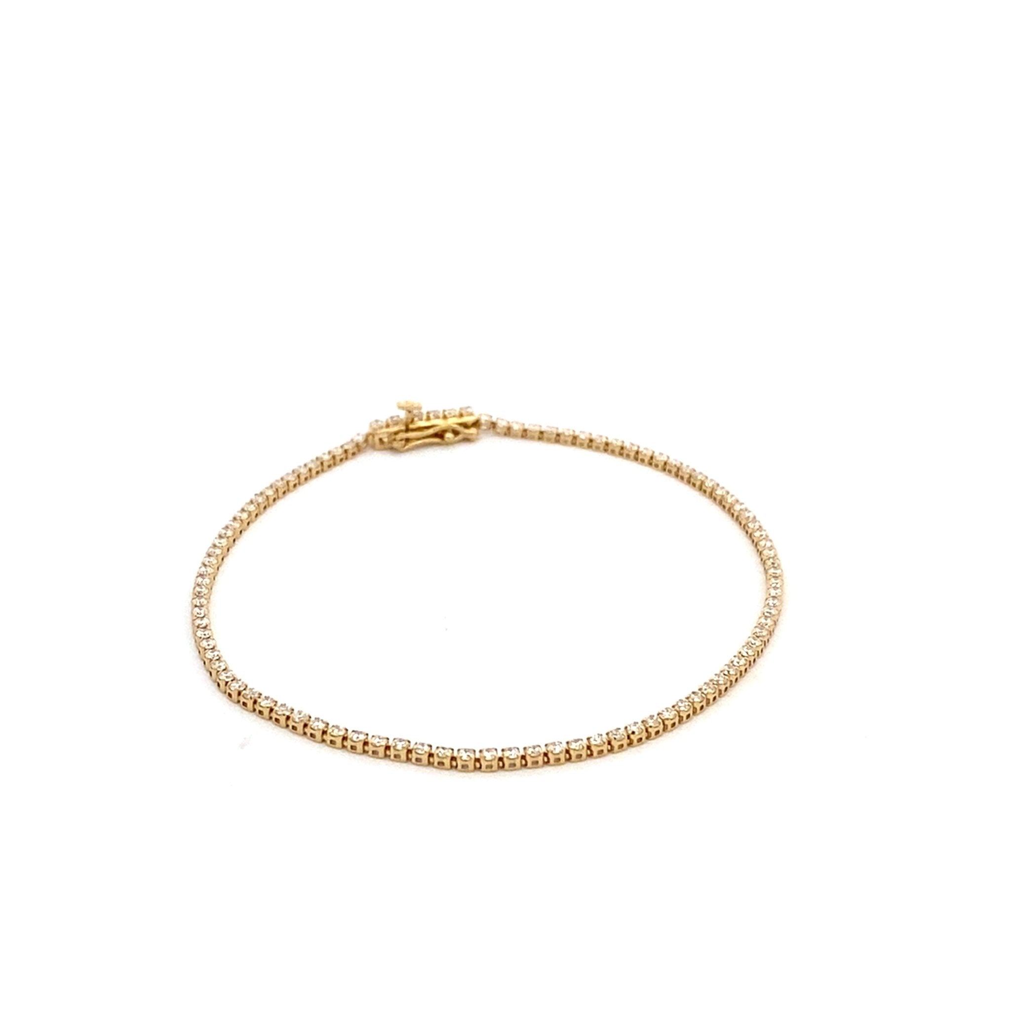 Diamond tennis bracelet with small lab diamonds=1.29ct in 14kt yellow gold - Gaines Jewelers