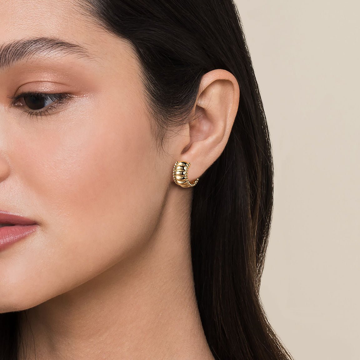 Earrings huggie hoops shrimp style 14kt yellow gold by Gabriel - Gaines Jewelers