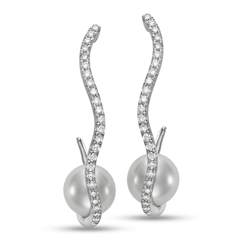 Earrings set with a large pearl sitting in an abstract loop of diamonds 18kt white gold - Gaines Jewelers