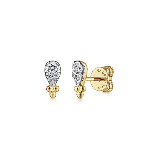 Earrings - tiny diamond studs overall pear shape 14kt yellow gold - Gaines Jewelers