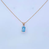 Emerald Cut Aqua and Round Diamond 14k Yellow Gold Pendant - Rego - Gaines Jewelers