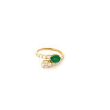 Emerald & diamond ring, bypass style, with baguette shank 18kt yellow gold by Raymond Mazza - Gaines Jewelers