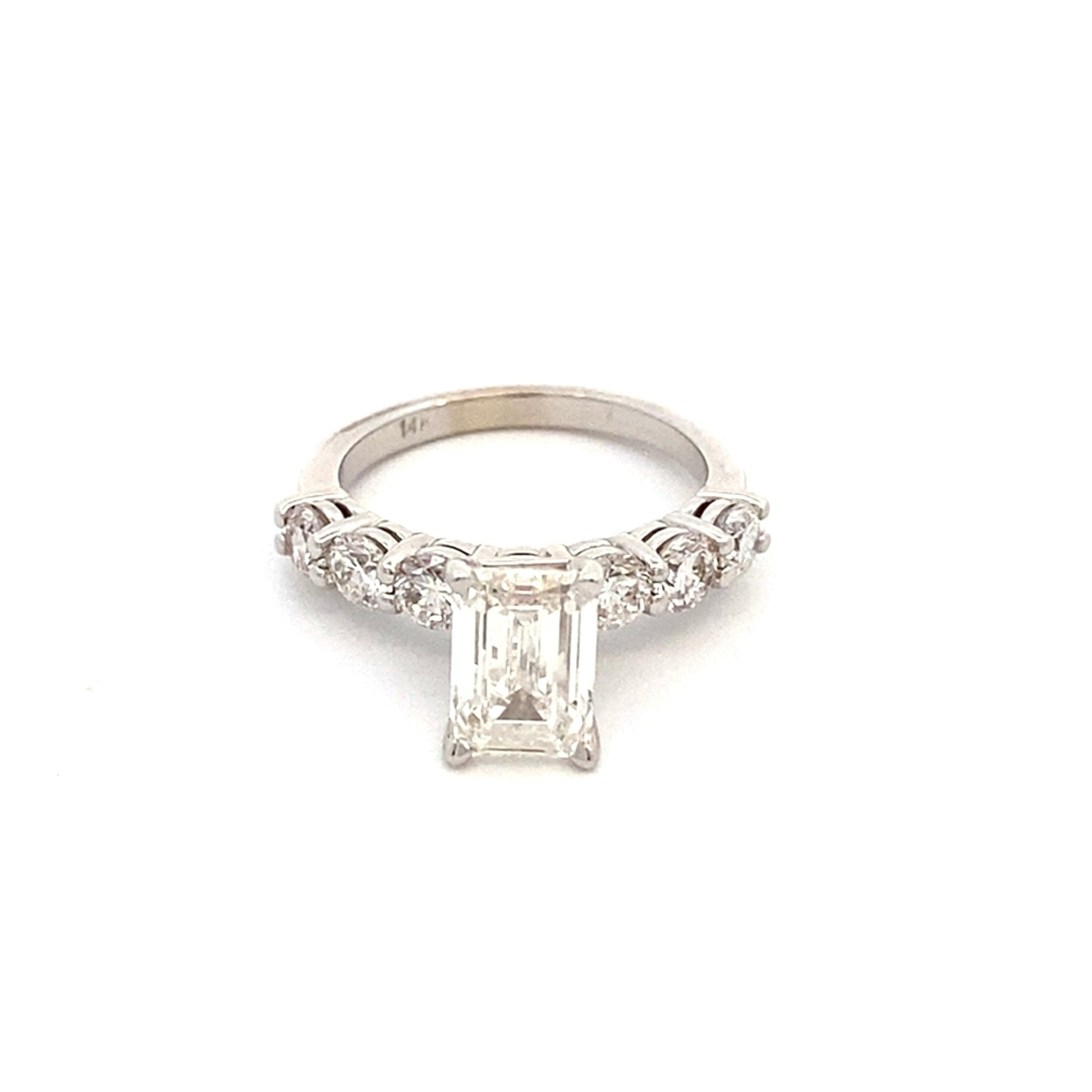 Engagement ring with emerald cut lab diamond center, natural diamond sides 14kt white gold - Gaines Jewelers