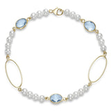 Fresh water pearl bracelet with blue topaz in 14kt yellow gold by Mastoloni - Gaines Jewelers