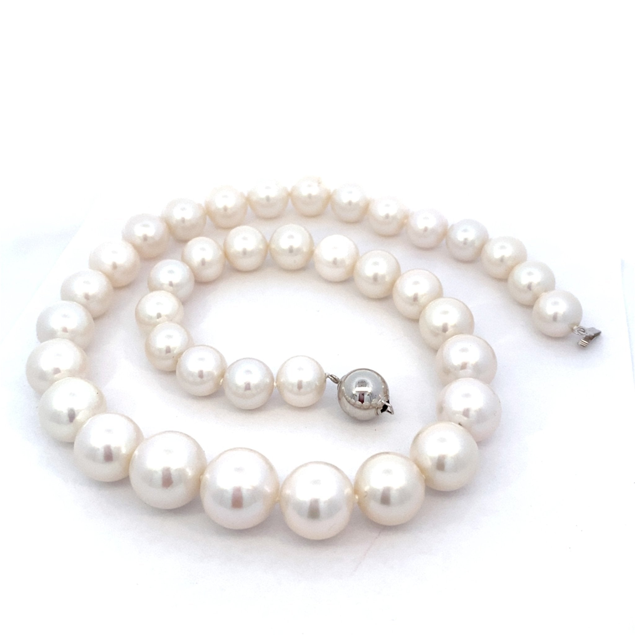 Fresh water strand of pearls, 10 - 14mm, slightly graduated in 14kt white gold by Mastoloni - Gaines Jewelers